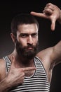 Portrait of beardy man in singlet Royalty Free Stock Photo