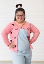 Portrait of beaufiful and cute teen Asian down syndrome girl posing as a model with fun and delight self-confidence Royalty Free Stock Photo