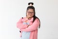 Portrait of beaufiful and cute teen Asian down syndrome girl posing as a model with fun and delight self-confidence Royalty Free Stock Photo