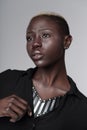 Portrait of beautiful african american woman wearing leather necklace with metal inserts