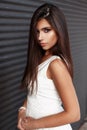 Portrait of a beautiful american model woman in a white dress Royalty Free Stock Photo