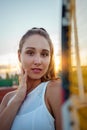 Portrait of a beautiful American woman. Sports tennis court, outdoor recreation. Fitness body, weight loss, active