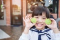 Portrait of beautiful asia Children feel happy eating two dessert tarts