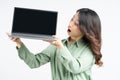 Portrait of the beautiful asian businesswoman looking at the laptop screen with a surprised expression Royalty Free Stock Photo