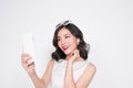 Portrait of beautiful asian fashionable girl taking selfie Royalty Free Stock Photo