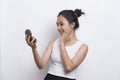 Beautiful asian woman applying powder at makeup of cosmetic  on white background Royalty Free Stock Photo