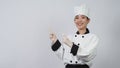 Portrait beautiful asian woman cook wearing chef uniform making gesture
