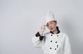 Portrait beautiful asian woman cook wearing chef uniform making gesture