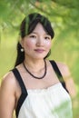 Portrait of beautiful asian woman smiling in park outdoor Royalty Free Stock Photo