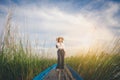 Portrait of beautiful Asian woman standing on fishing boat, enj