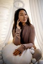 Portrait of beautiful asian woman with white angel nimbus on head