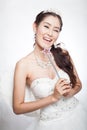 Portrait beautiful asian woman in white wedding dress with fairy scepter with angel wings Royalty Free Stock Photo