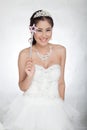 Portrait beautiful asian woman in white wedding dress with fairy scepter with angel wings