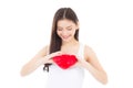 Portrait of beautiful asian young woman holding red heart shape pillow and smile isolated on white background Royalty Free Stock Photo