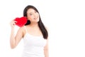 Portrait of beautiful asian young woman holding red heart shape pillow and smile isolated on white background Royalty Free Stock Photo