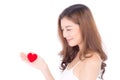 Portrait of beautiful asian young woman holding red heart shape pillow and smile isolated on white background Royalty Free Stock Photo