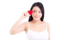 Portrait of beautiful asian young woman holding red heart shape pillow and smile isolated on white background Royalty Free Stock Photo