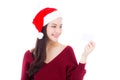 Portrait of beautiful asian young woman in santa hat smile holding credit card Royalty Free Stock Photo