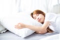 Portrait of beautiful asian young woman sleep lying in bed with head on pillow comfortable and happy with leisure. Royalty Free Stock Photo