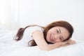 Portrait of beautiful asian young woman sleep lying in bed with head on pillow comfortable and happy with leisure Royalty Free Stock Photo