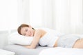 Portrait of beautiful asian young woman sleep lying in bed with head on pillow comfortable and happy with leisure. Royalty Free Stock Photo