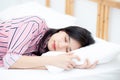 Portrait of beautiful asian young woman sleep lying in bed with head on pillow comfortable and happy with leisure.