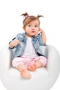 Portrait of a beautiful baby girl, talking on the phone Royalty Free Stock Photo