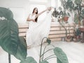 Portrait of beautiful balerina woman weared in white dress