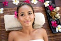 Portrait of beautiful Balinese woman on massage desk