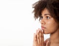 Portrait beautiful black woman praying, young girl with her hands together, closeup expression. Religion faith and Royalty Free Stock Photo