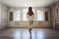 Portrait of a beautiful blonde bride in the interior. Morning young bride in a bathrobe. Wedding photography. Smiling