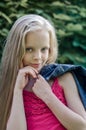 Portrait of a beautiful blonde little girl with long hair. Royalty Free Stock Photo