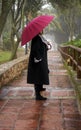 Portrait of beautiful blonde woman with red umbrella Royalty Free Stock Photo