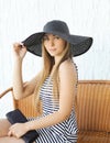 Portrait of beautiful blonde woman wearing a straw hat Royalty Free Stock Photo