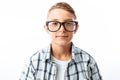 Portrait of beautiful boy with glasses, teen nerd smiling, in Studio on white background Royalty Free Stock Photo