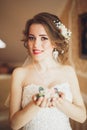 Portrait of beautiful bride with fashion veil and dress at wedding morning Royalty Free Stock Photo