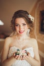 Portrait of beautiful bride with fashion veil and dress at wedding morning Royalty Free Stock Photo