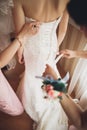 Portrait of beautiful bride with fashion veil and dress at wedding morning Royalty Free Stock Photo