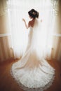 Portrait of beautiful bride with fashion veil and dress at wedding morning Royalty Free Stock Photo