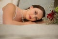 Portrait of beautiful bride relaxing on bed at home Royalty Free Stock Photo