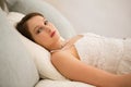 Portrait of beautiful bride relaxing on bed Royalty Free Stock Photo
