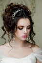 Portrait of a beautiful bride, sweet and sensual. Wedding make up and hair.