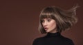 Portrait of a beautiful brown-haired woman with a short haircut