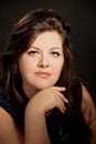 Portrait of beautiful brunette plus size young woman