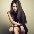 Portrait of beautiful brunette woman in black dress Royalty Free Stock Photo