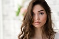 Portrait beautiful brunette woman with curly hair closeup Royalty Free Stock Photo