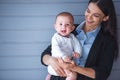 Business lady with her baby Royalty Free Stock Photo