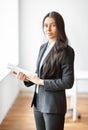 Portrait of beautiful business woman with documents in the Royalty Free Stock Photo