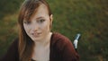 Portrait of beautiful caucasian disabled girl enjoying the breeze in the nature