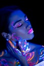 Portrait of beautiful caucasian fashion model with fluorescent make-up Royalty Free Stock Photo
